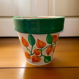 Hand crafted upcycled Terra cotta pot painted white green orange floral vine